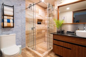 Shower, hair dryer, towels, soap