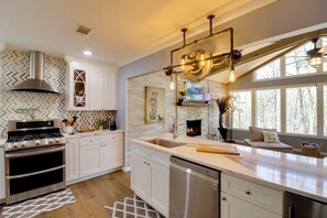 Fridge, microwave, oven, stovetop - Lakeside Retreat on 10 Secluded Wooded Acres, Hot Tub, Level 2 EV Charger (Greers Ferry)