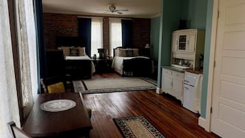 Deluxe Studio, 2 Double Beds | Minibar, individually decorated, individually furnished