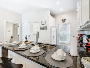 Fridge, microwave, oven, stovetop - Family-Friendly 3BR Home w/ Pool, BBQ & Themed Rooms – 15 Min to Disney! (Kissimmee)