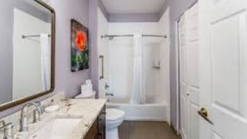 Hair dryer, towels, soap, shampoo