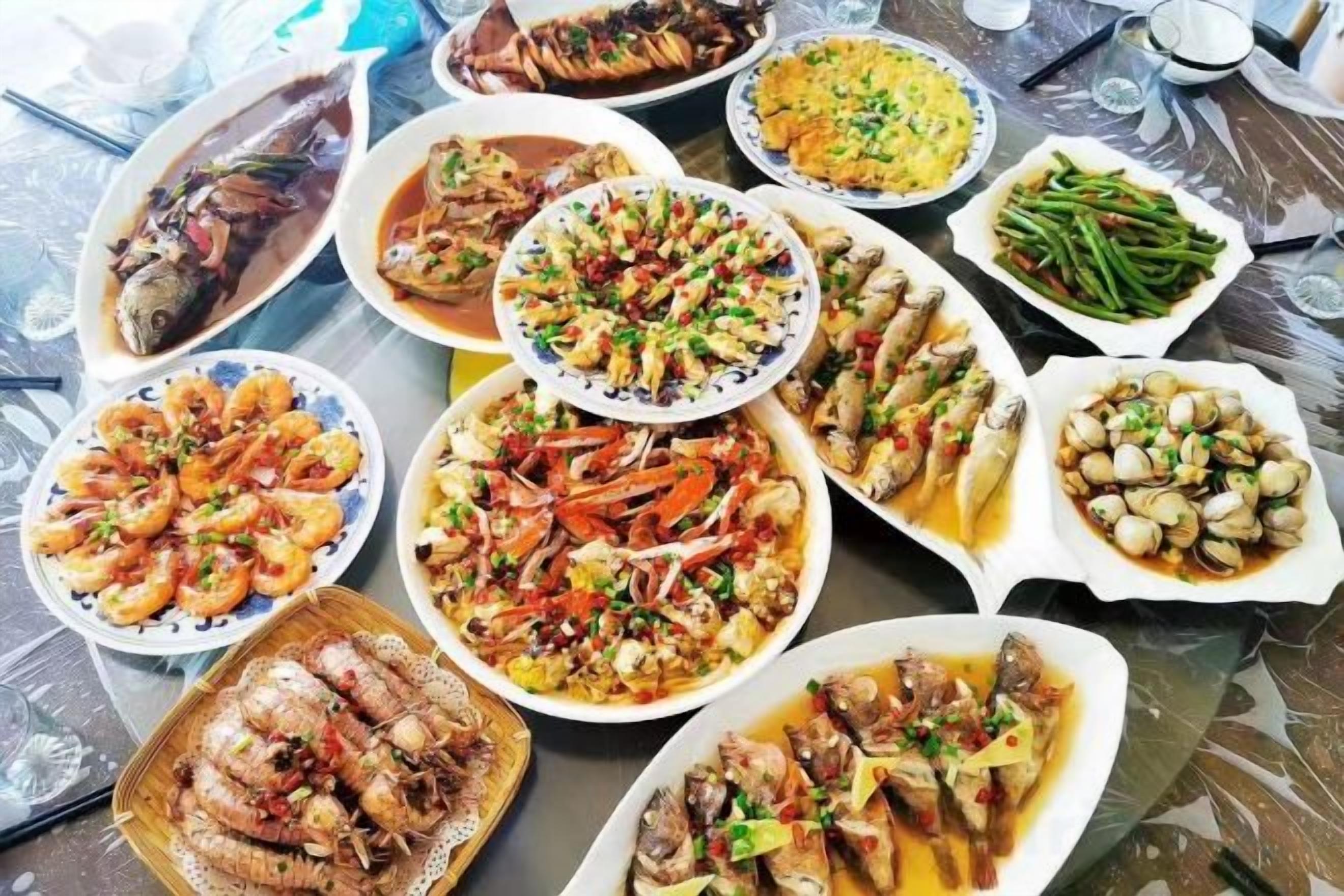 A table with various seafood dishes.