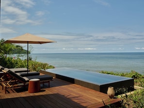 Habitación, varias camas, frente al océano (Sunset Villa) | Terraza o patio