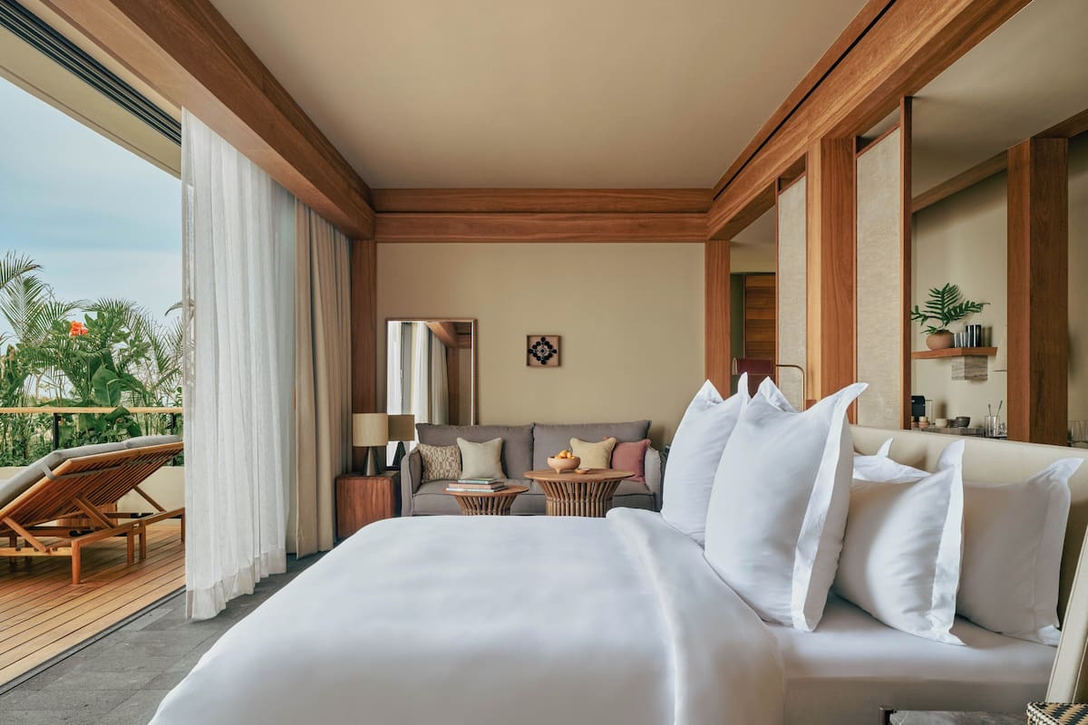 Premium bedding, free minibar items, in-room safe