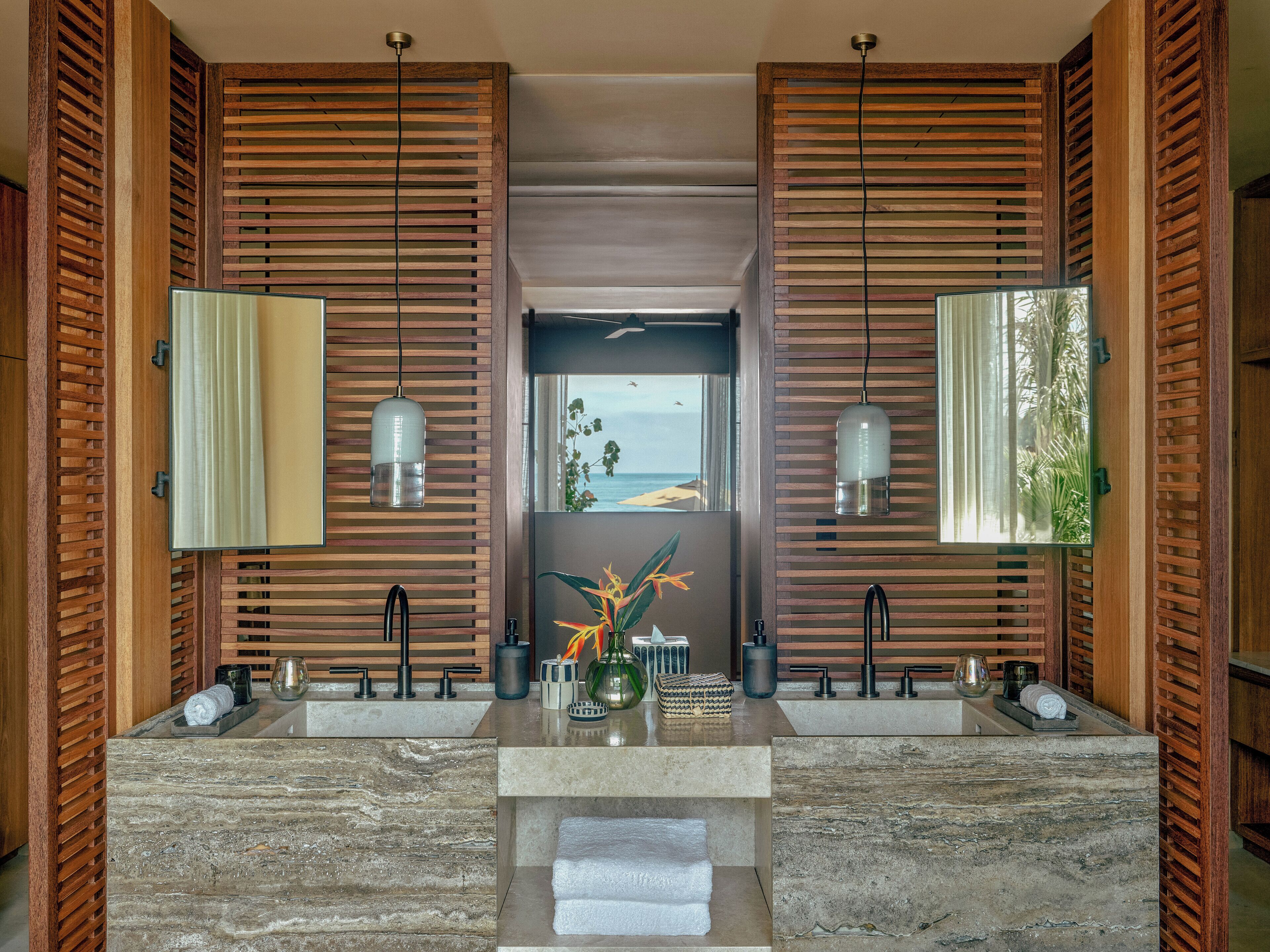 Separate bathtub and shower, rainfall showerhead, designer toiletries