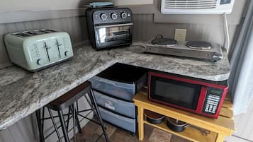 Fridge, microwave, coffee/tea maker, toaster