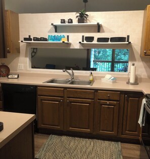 Fridge, microwave, oven, stovetop - Charming family friendly home in quiet convient neighborhood. (Sioux Falls)