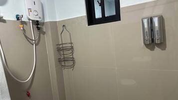 Shower, towels, toilet paper