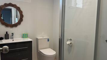 Hair dryer, towels, soap, toilet paper