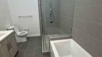 Shower, hair dryer, towels, soap