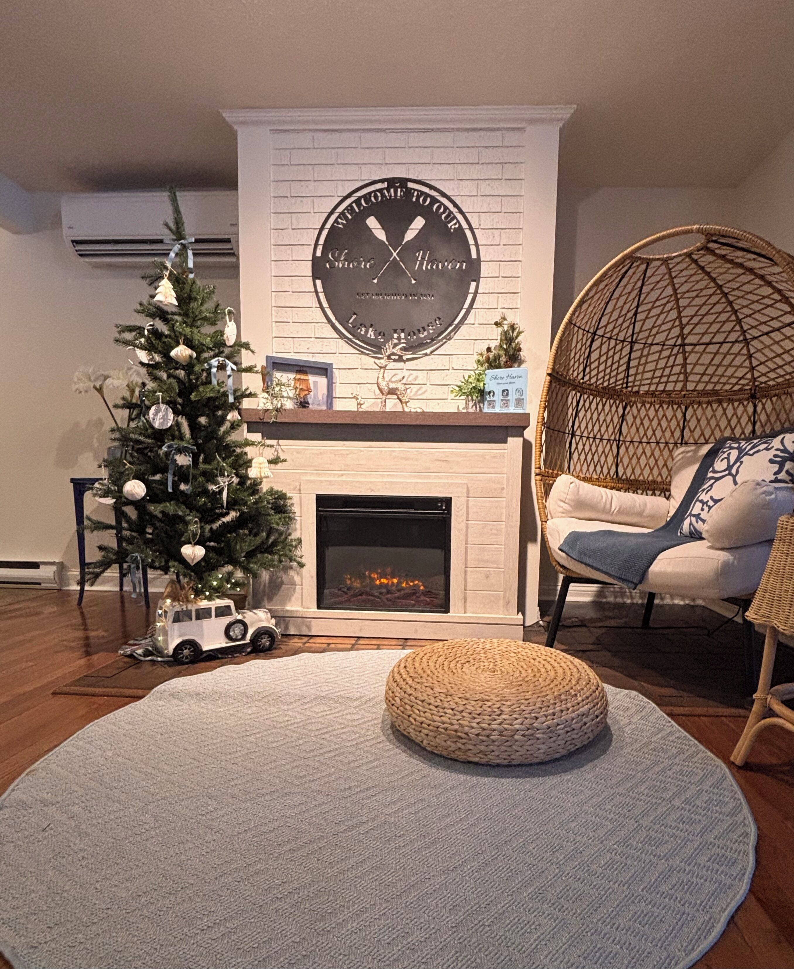 The coziest corner of the house, wrapped in twinkle lights and holiday magic.