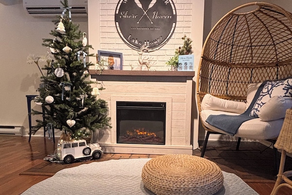 The coziest corner of the house, wrapped in twinkle lights and holiday magic.