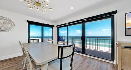 Direct oceanfront corner penthouse with huge wrap-around balcony offering beach and pool views