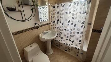 Hair dryer, towels, soap, shampoo