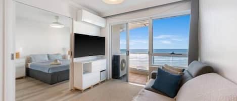 Apartment, 1 Bedroom, Ocean View | Living area | TV