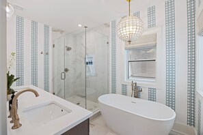 Shower, hair dryer, towels, soap