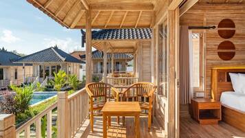 Bungalow, Balcony, Pool View | 2 bedrooms, desk, laptop workspace, free WiFi