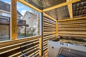 Outdoor spa tub - Izzy's Getaway: A Cozy Retreat in Pigeon Forge with hot tub, game room, and river access (Pigeon Forge)