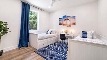 3 bedrooms, desk, iron/ironing board, travel crib