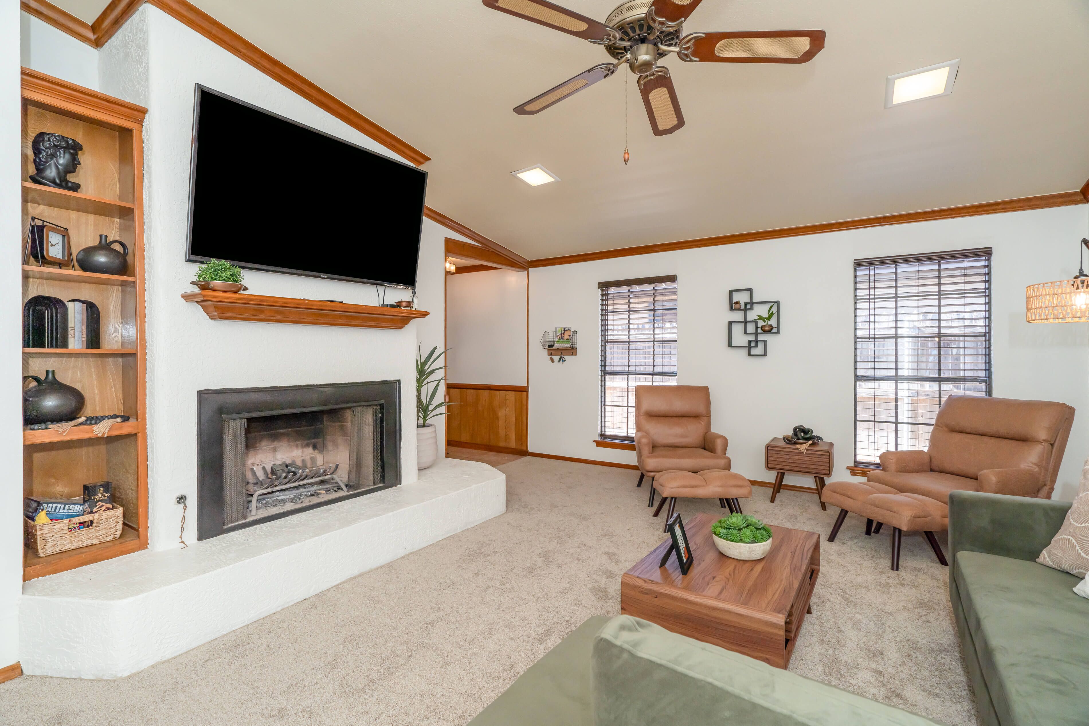 Smart TV, fireplace, books