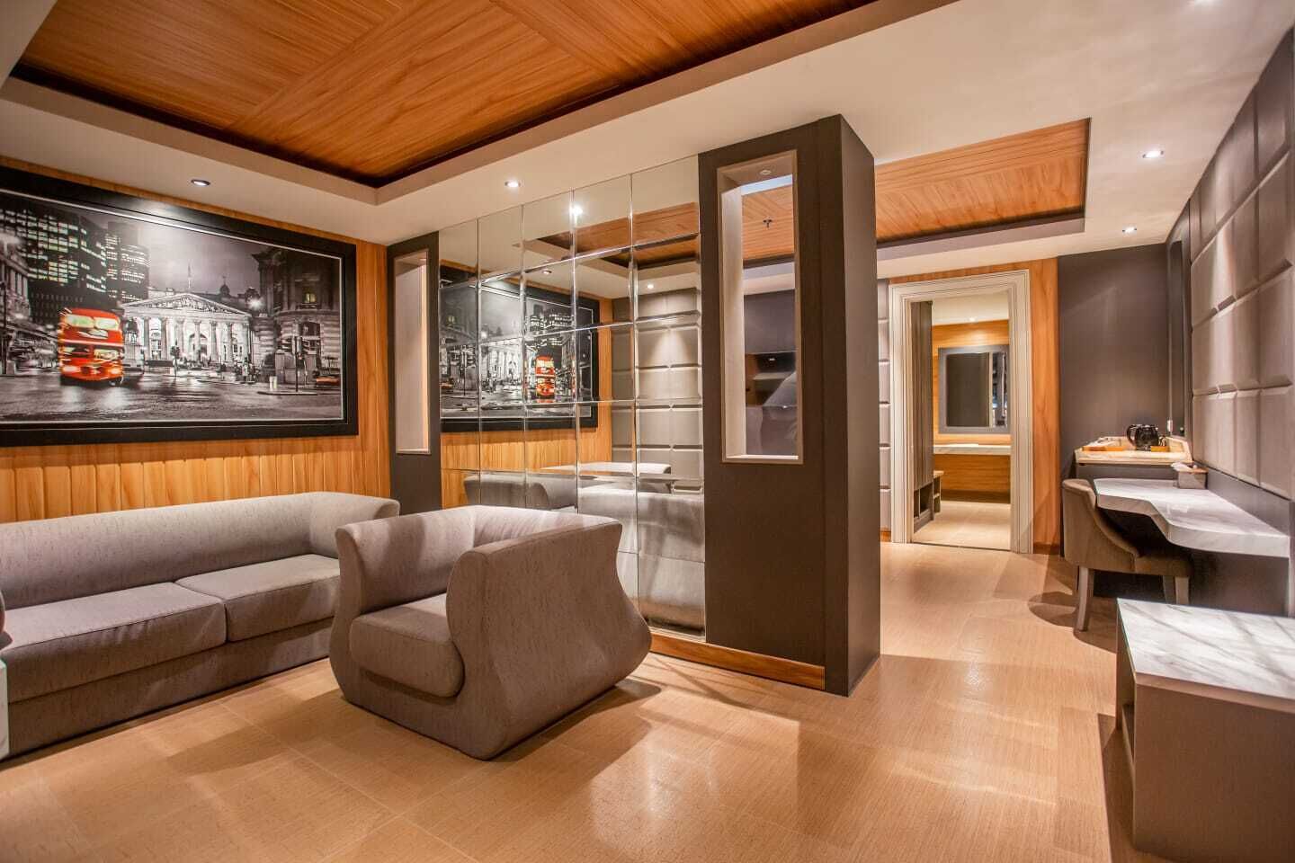 PRESIDENT SUITE | Zona de estar | Televisión LED de 40 pulgadas con canales por cable