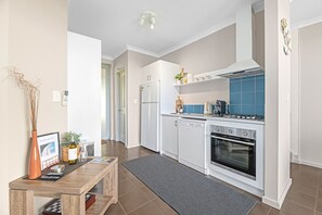 Microwave, oven, stovetop, dishwasher - Luxurious 2-Bedroom Spa Apartment with Ocean Views (KRONKUP)