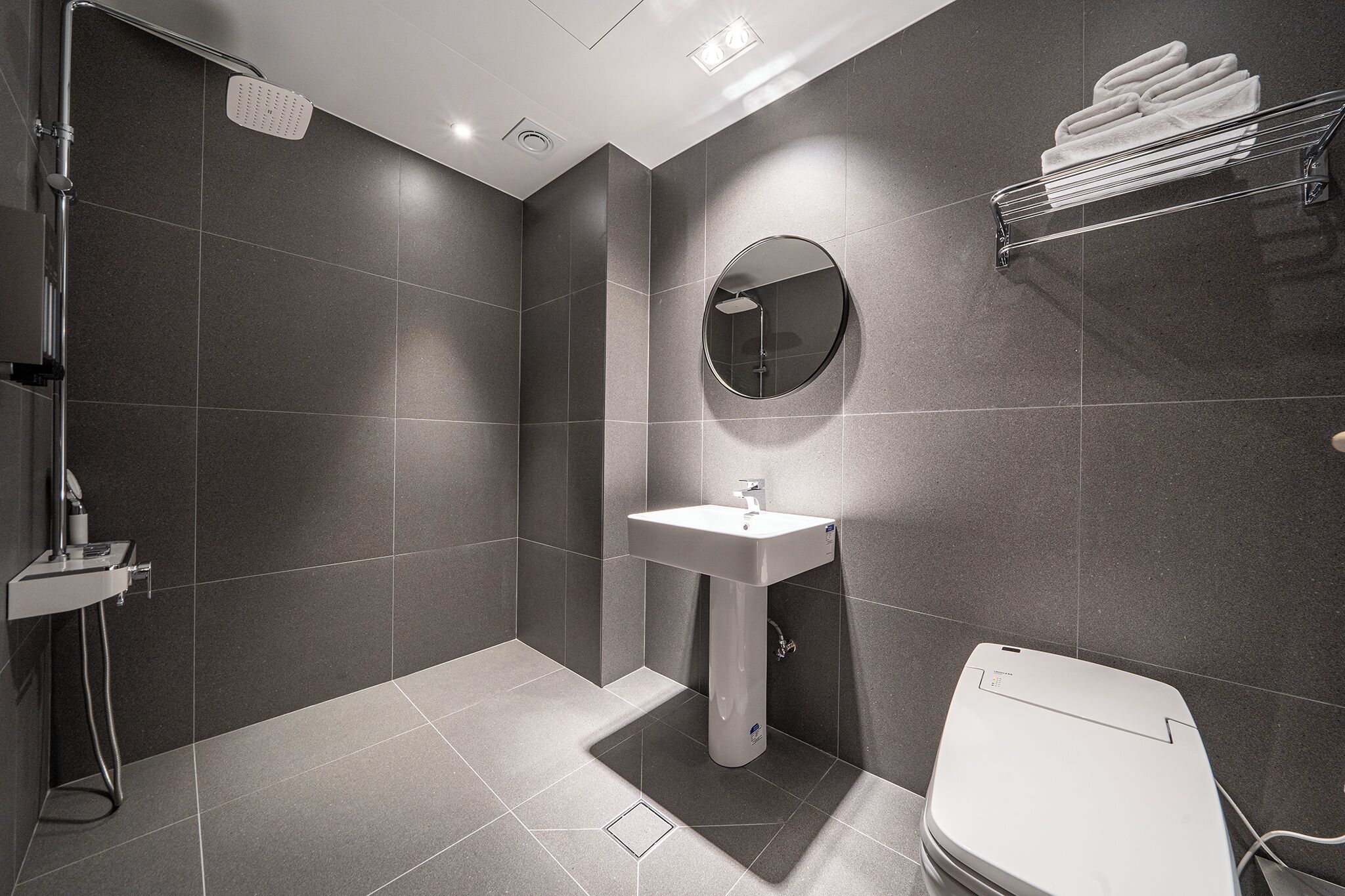 Shower, free toiletries, hair dryer, slippers