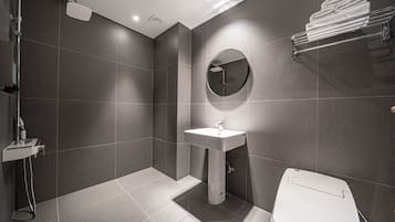 Shower, free toiletries, hair dryer, slippers