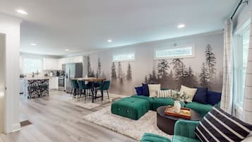 Télévision, cheminée, baby-foot