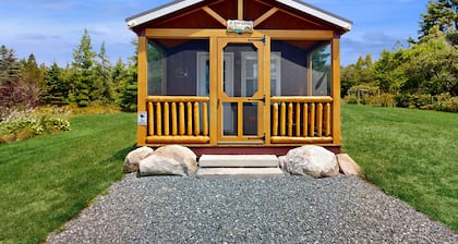 Charming Coastal Retreat with Ocean Views, Porch and Private Cabin