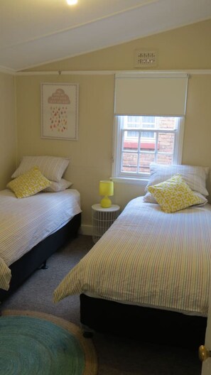 2 bedrooms, desk, iron/ironing board, travel cot