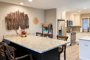 Dining - Lake-view dog-friendly condo with pools, hot tub, sauna, tennis, & balcony (Sapphire)