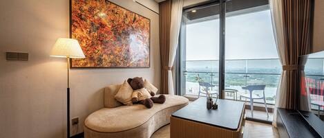 Executive Double Room, 2 Bedrooms | Living area | 65-inch flat-screen TV with satellite channels, Netflix