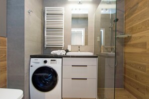 Hair dryer, towels, soap, shampoo