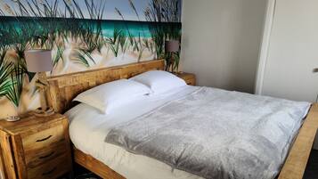 2 bedrooms, desk, iron/ironing board, travel crib