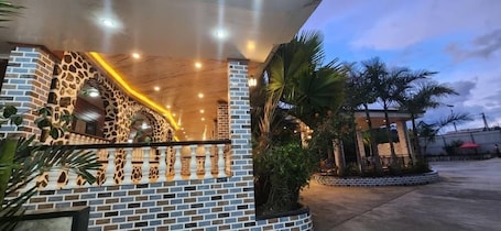 Terrace/patio. McRoyal Hotel