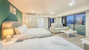 Premium Triple Room, City View | 1 bedroom, blackout curtains, free WiFi