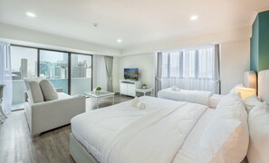 Premium Triple Room, City View | Blackout drapes, free WiFi