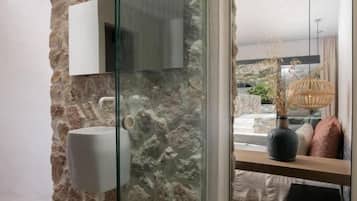 Honeymoon Room | Bathroom | Shower, hair dryer, slippers, towels