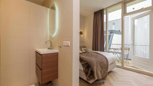 Habitación Confort, balcón | Baño | Regadera, secadora de cabello, toallas, jabón