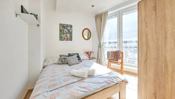 2 habitaciones, tabla de planchar con plancha, wifi y ropa de cama