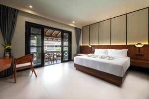 Deluxe Double Room, Balcony, Pool View | In-room safe, desk, laptop workspace, iron/ironing board