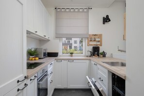 Apartment, 1 Bedroom, Terrace, Garden View | Private kitchen | Microwave, oven, coffee/tea maker, electric kettle - Warsaw Apartment With Garden by Renters (Warsaw)
