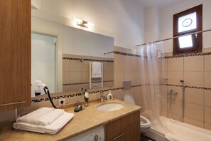 Hair dryer, towels, soap, shampoo