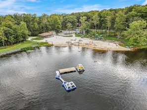 Enjoy community amenities including a scenic lake and fun inflatables for a splash-tastic time.