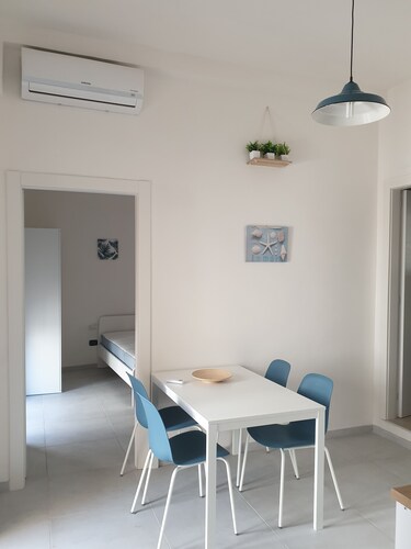 Comfortable one-bedroom apartment with kitchen and terraced balcony with mountain view