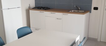 Comfortable one-bedroom apartment with kitchen and terraced balcony with mountain view