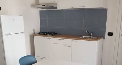 Comfortable one-bedroom apartment with kitchen and terraced balcony with mountain view