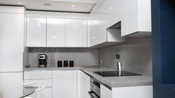 Luxury Condo, 1 Double Bed, Balcony, City View | Private kitchen | Full-size fridge, oven, stovetop, dishwasher