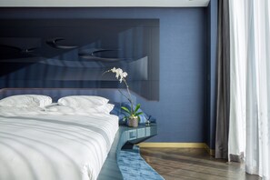 Premium bedding, minibar, in-room safe, desk